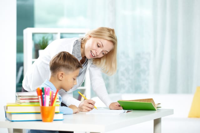 Students sitting at desk in classroom