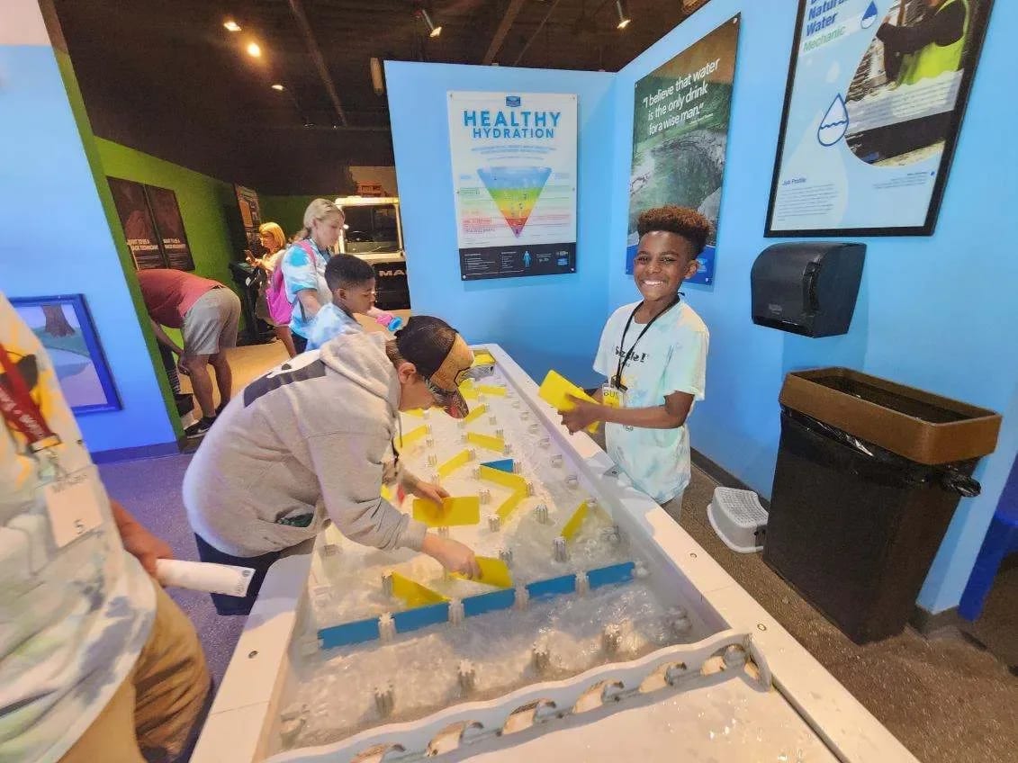 Kids playing hydration game.