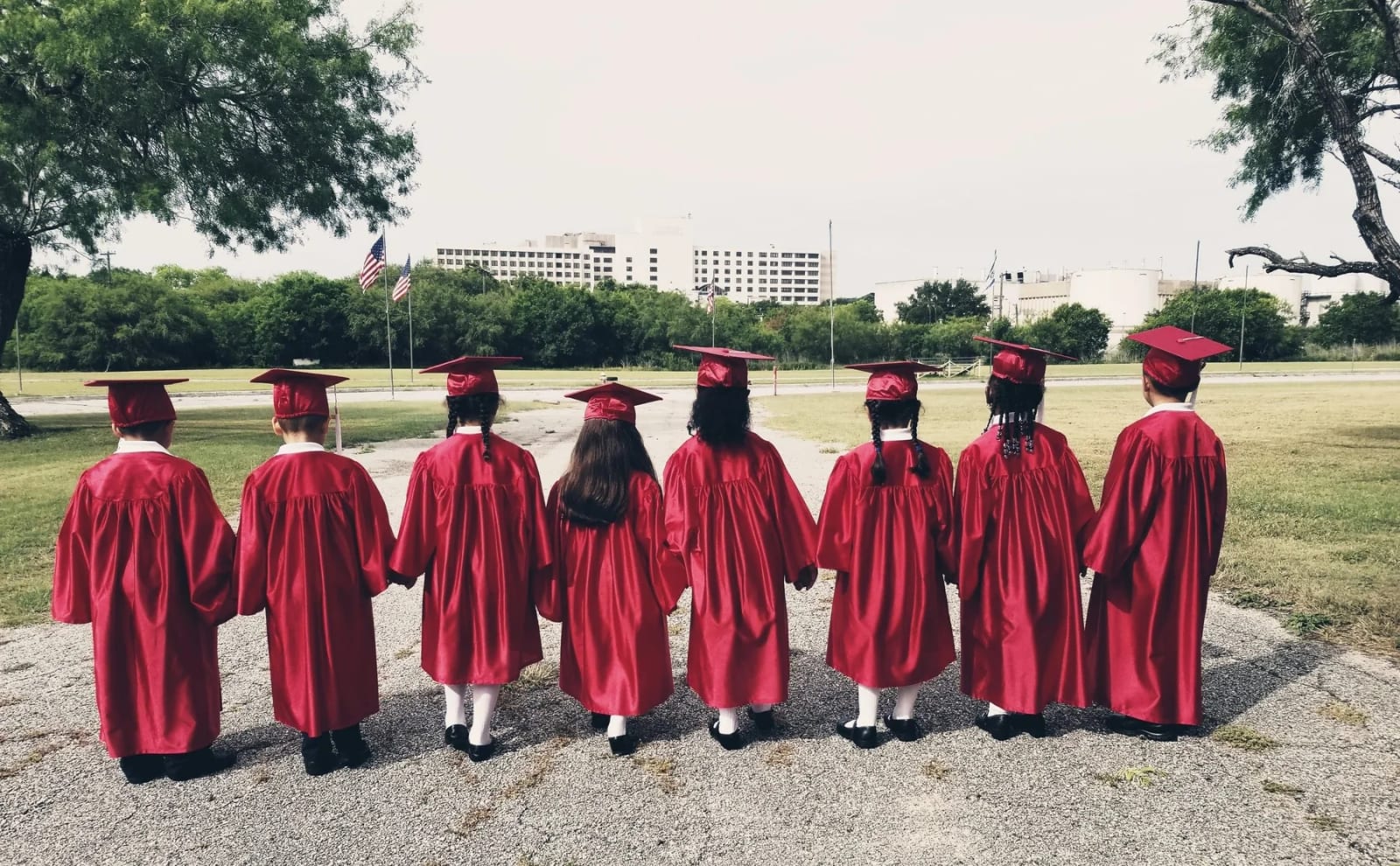 New Life Christian Academy graduates standing together outdoors