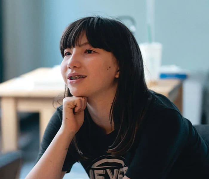 A New Way Academy student speaks during a classroom discussion