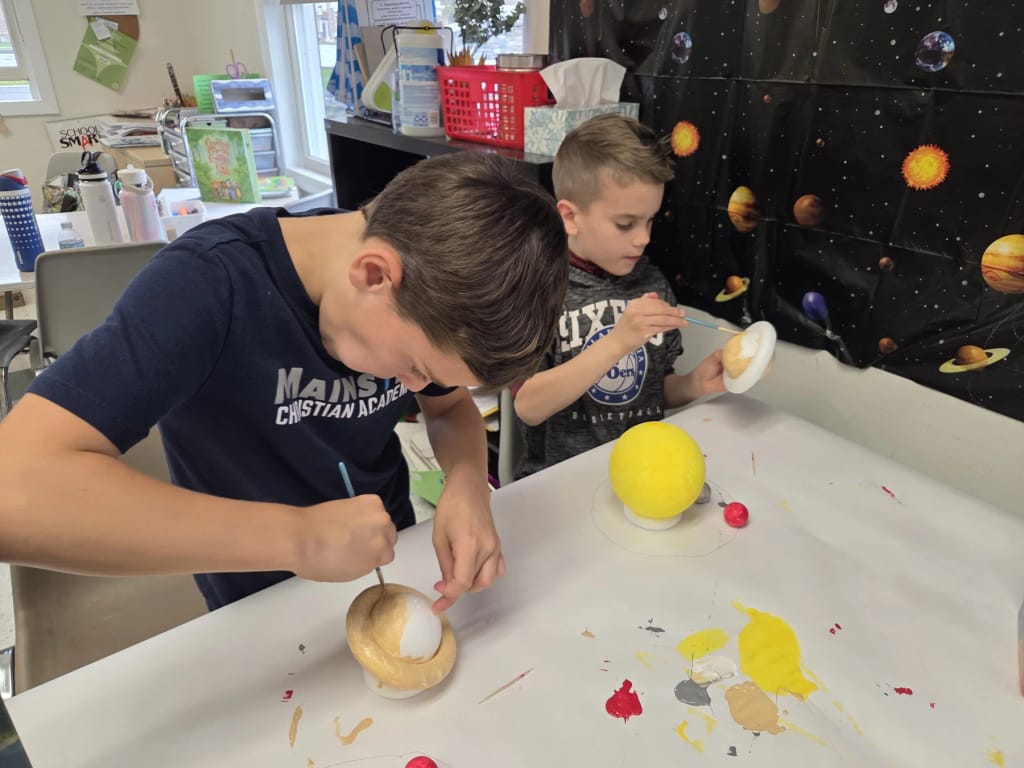 Mainstay Christian Academy students completing a science activity