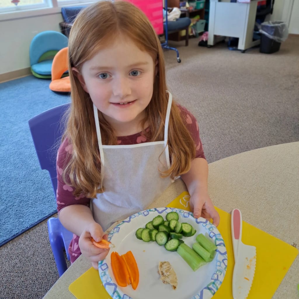 Mainstay Christian Academy student preparing food in class