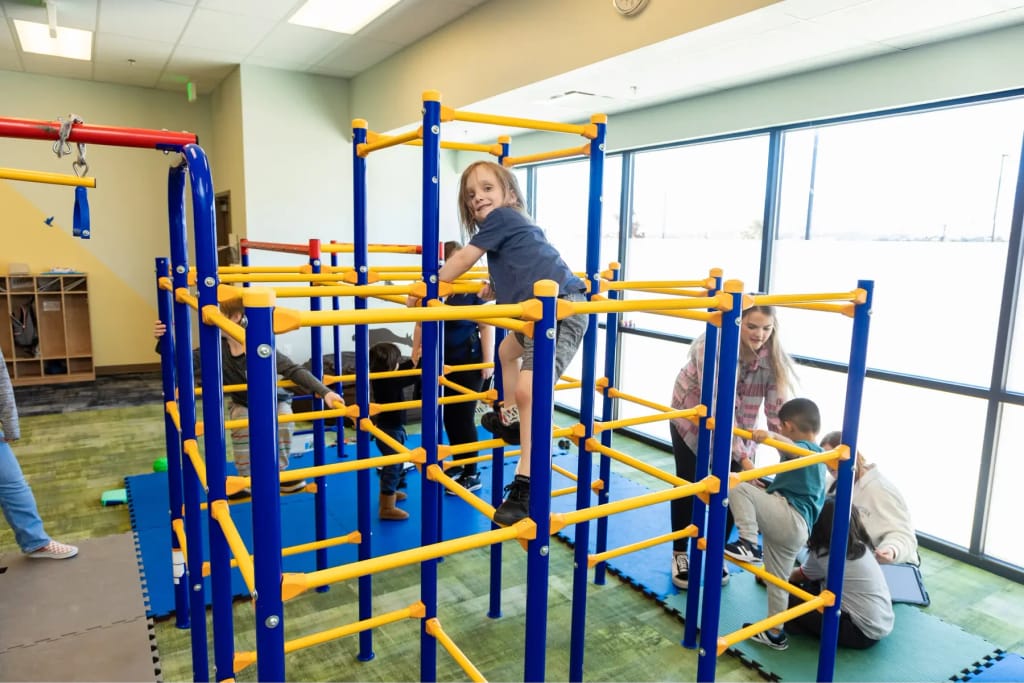 Large indoor movement gym at Woven Care Woodmen