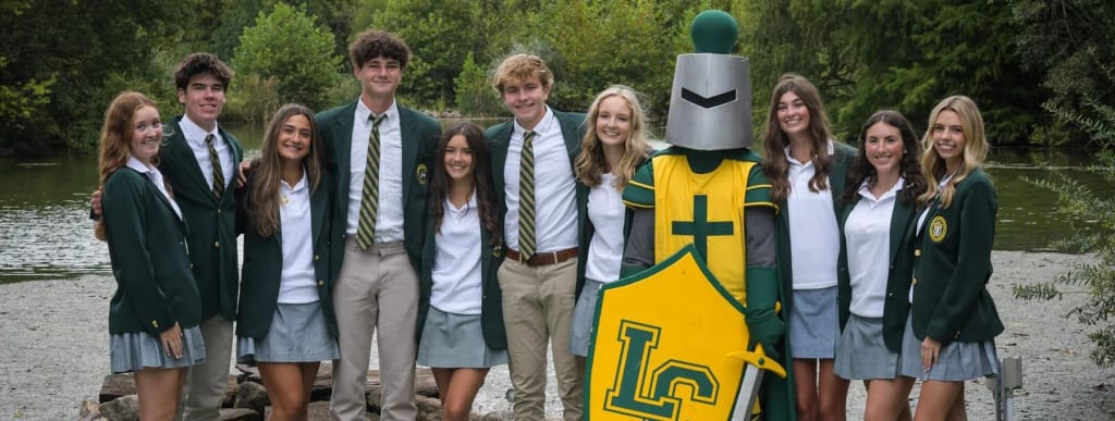 Lansdale Catholic High School students pose with the school mascot.