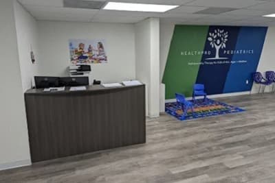 Reception area inside the HealthPRO Pediatrics Lakeland center.
