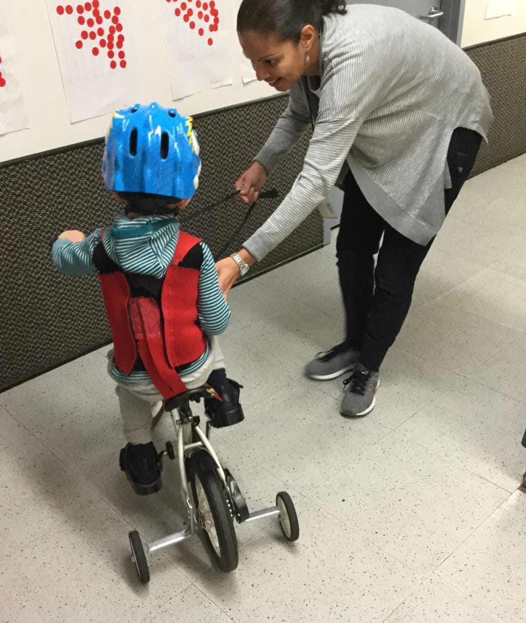 Steppingstone Day School student practicing bicycle skills