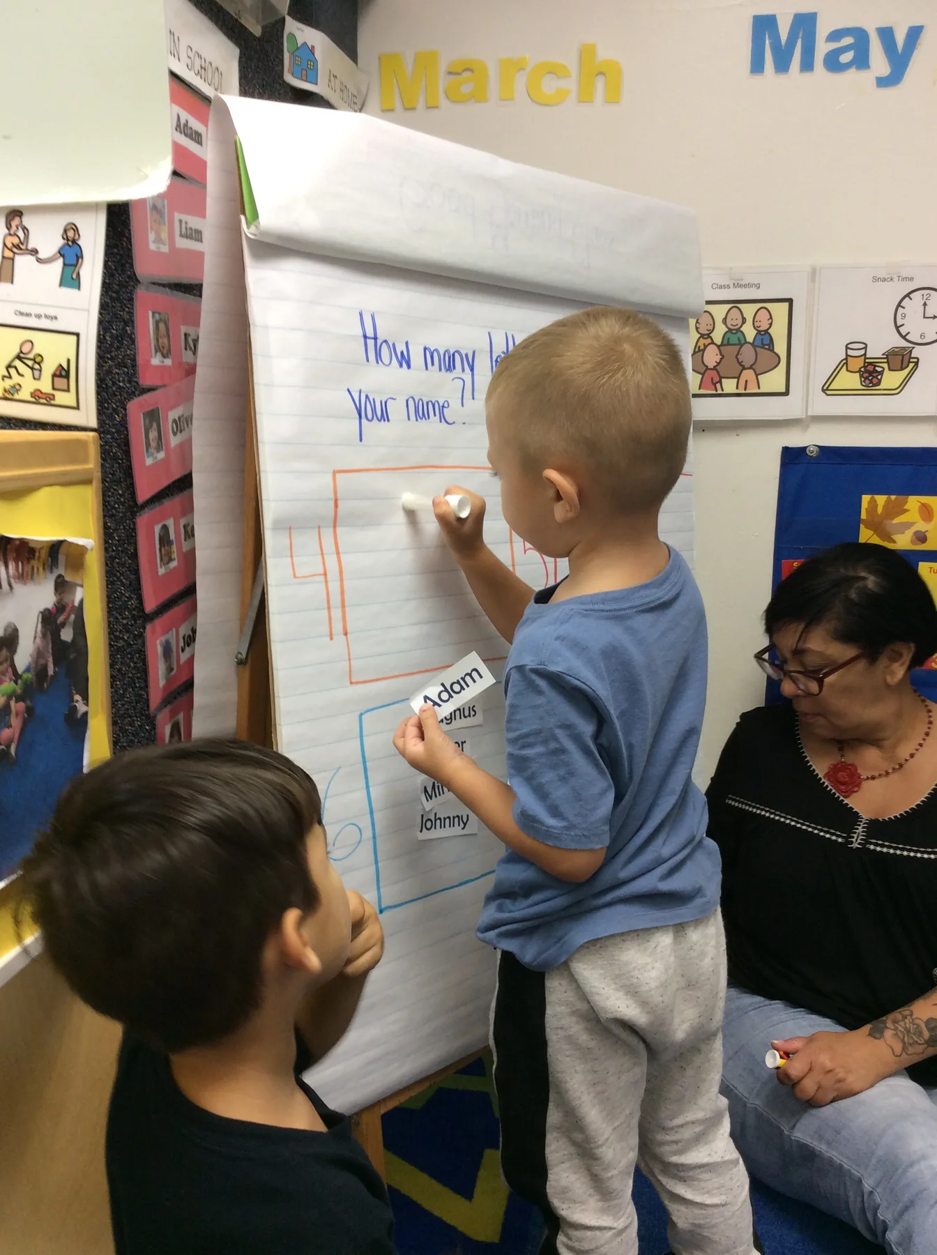 Steppingstone Day School student working at a classroom whiteboard
