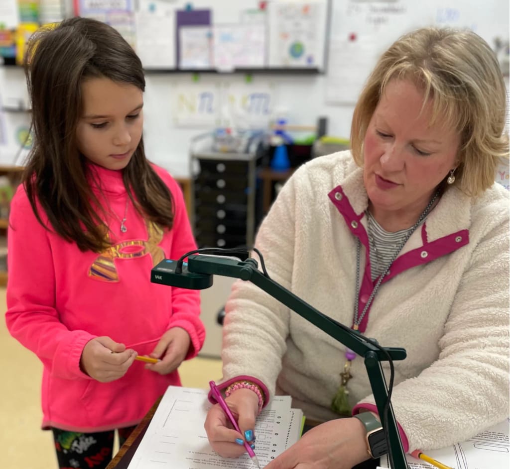 Student and teacher working together at Eugene Christian School