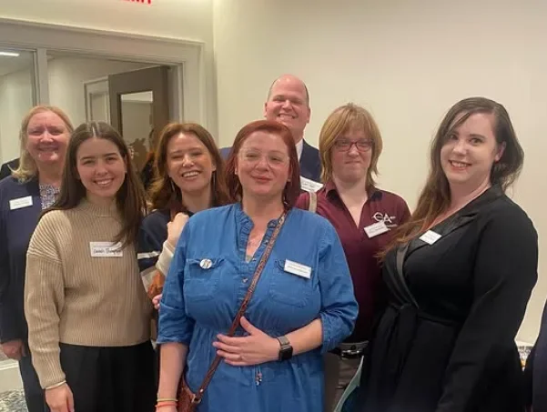 Commonwealth Autism staff and community members gathered together.