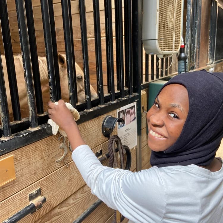 A student participating in a community outing at Collective Learning Academy of Atlanta