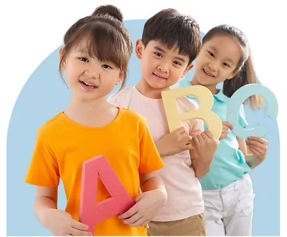 Children playing with large alphabet blocks