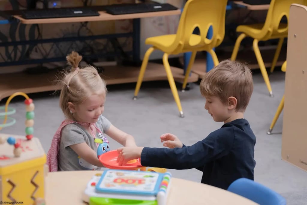 Children participating in a hands-on group activity at Behavior Frontiers.