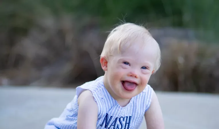 A young Rise School of Dallas student enjoys time outdoors
