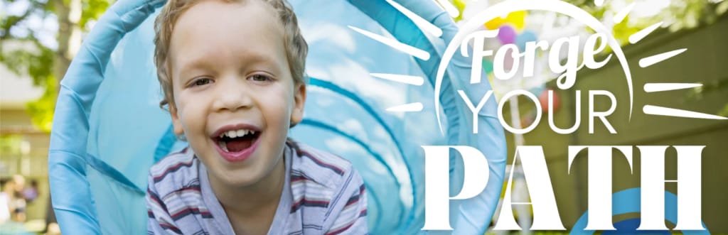 Smiling child pictured with a mountain-themed message