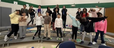 Samuelson Elementary students performing in the gym