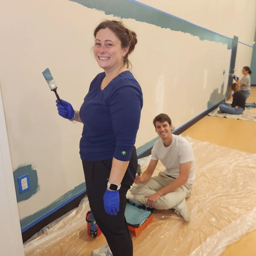 Staff improving the school learning space at Heart of Hope Academy