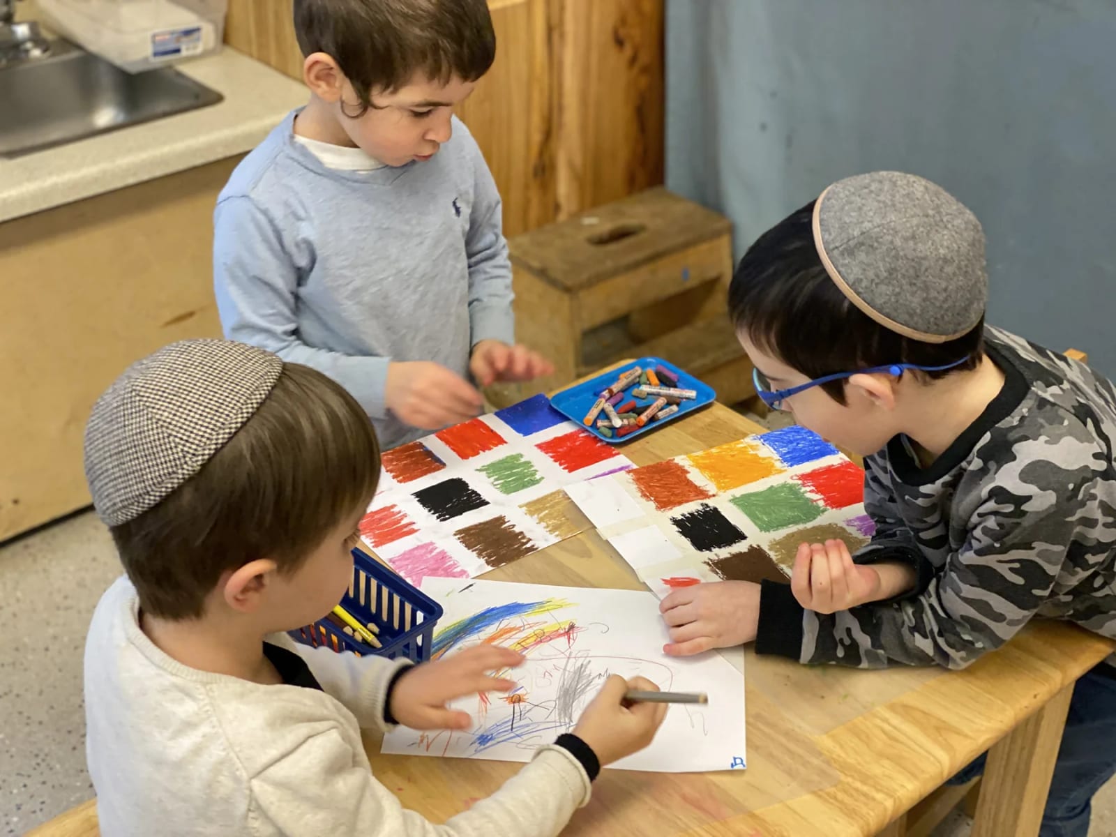 Children working together in a Seattle Jewish Montessori classroom