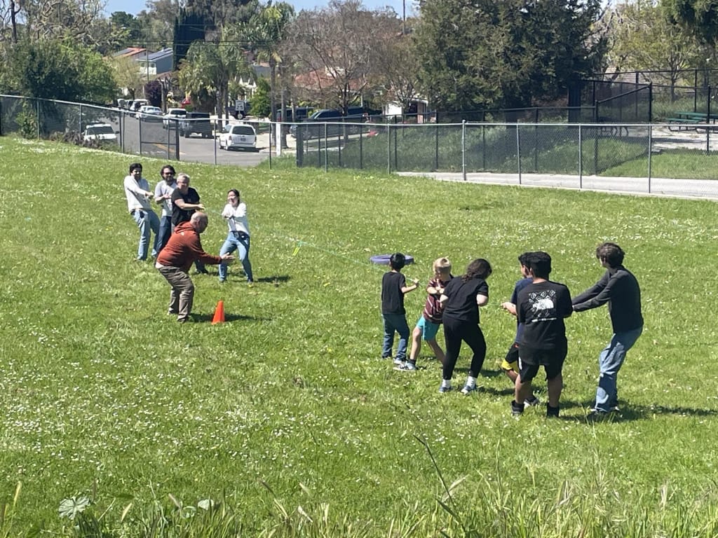 Kinship Academy students participating in an outdoor team activity