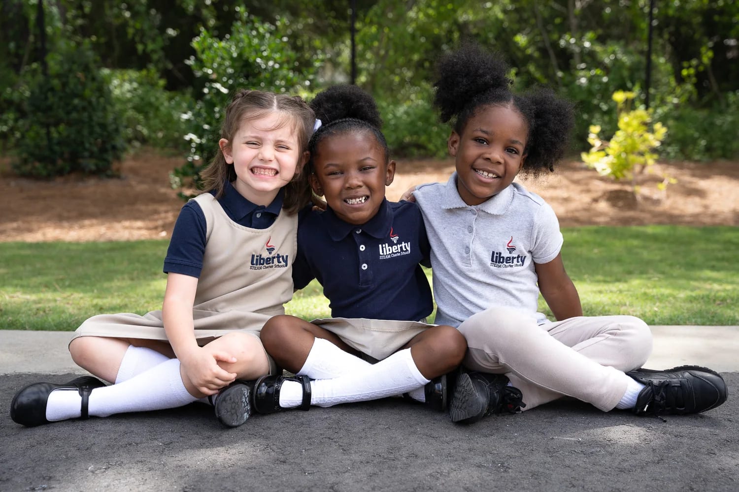Liberty STEAM Charter School-Primary Academy in Sumter: Liberty STEAM Charter School scholars gathered outdoors in school uniforms.