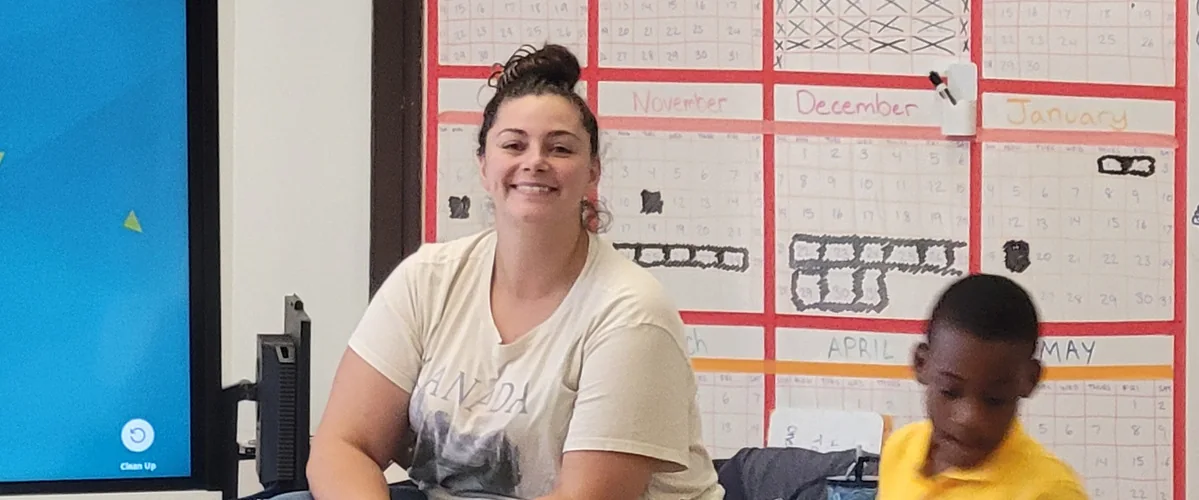 A teacher and student inside a classroom at Fort Dearborn Elementary School