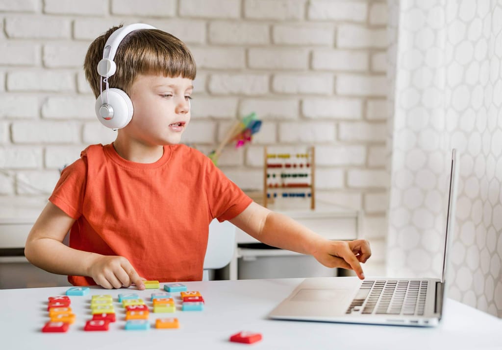 Child engaged in a guided learning activity