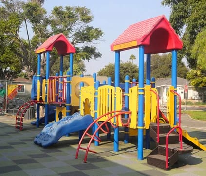 Colorful playground equipment at Open Magnet Charter School in Los Angeles