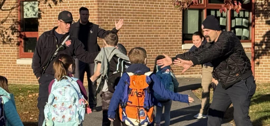 Edmund Hatch Bennett Elementary students arrive for a school activity.
