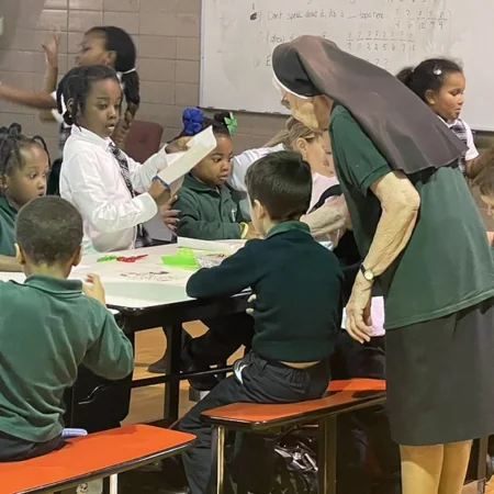 Our Lady of Lourdes School students participate in a classroom activity.