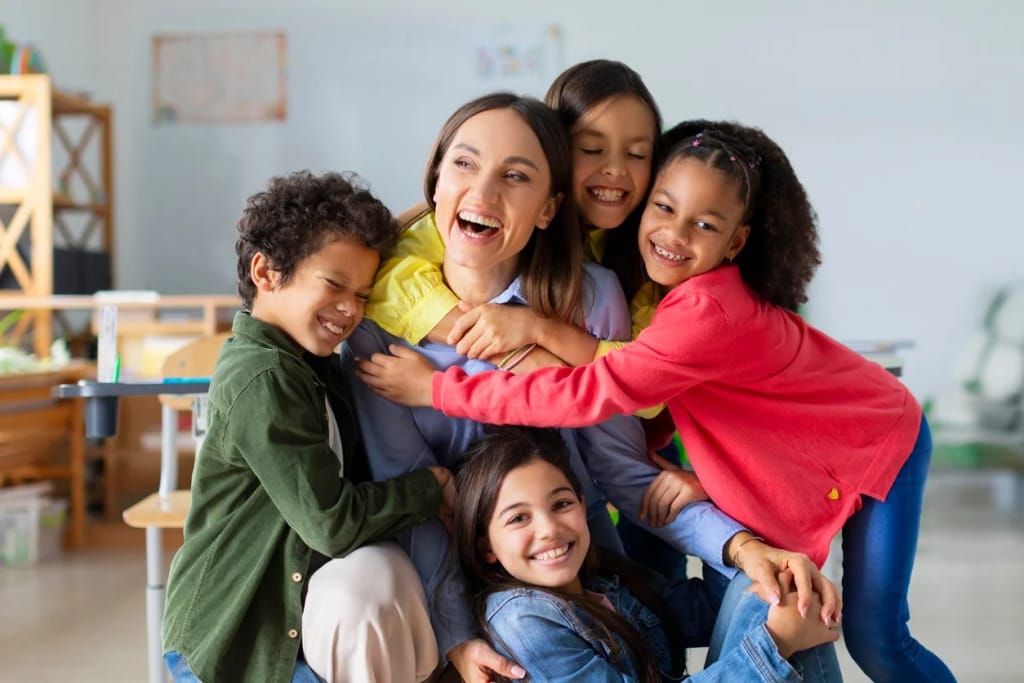 Adult surrounded by smiling children
