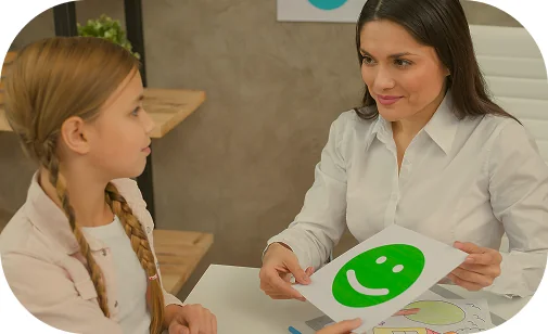 Adult using a visual emotion card with a child