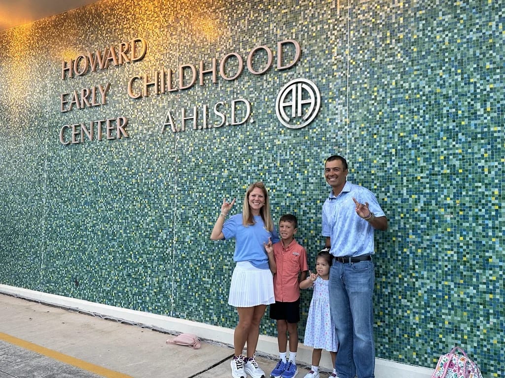 Woodridge Elementary family at the school entrance