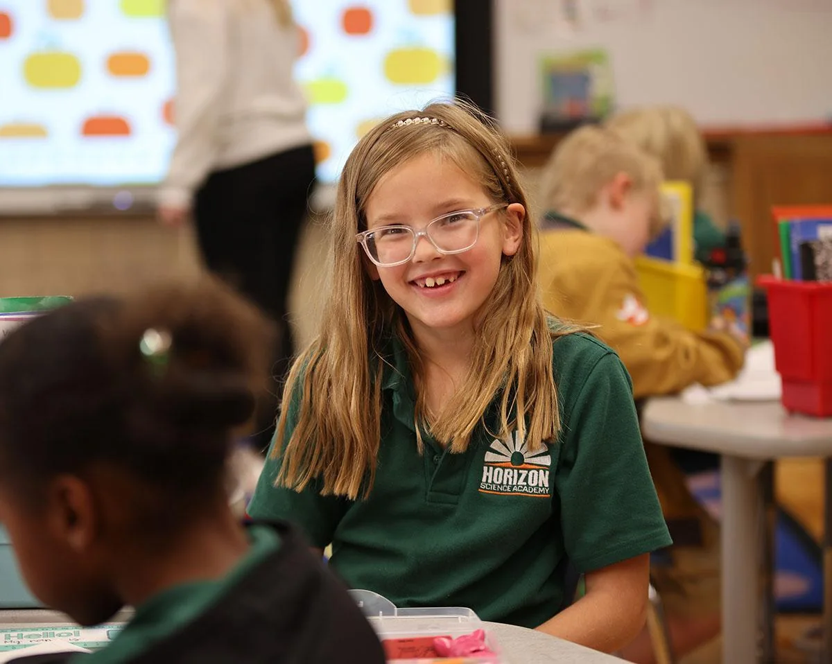 Horizon Science Academy student smiling in class