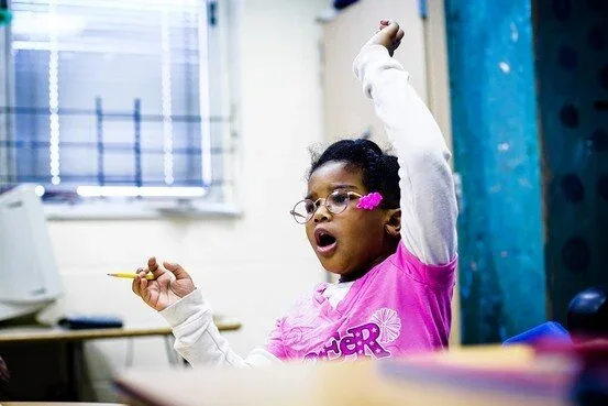 League School student participating in a classroom activity