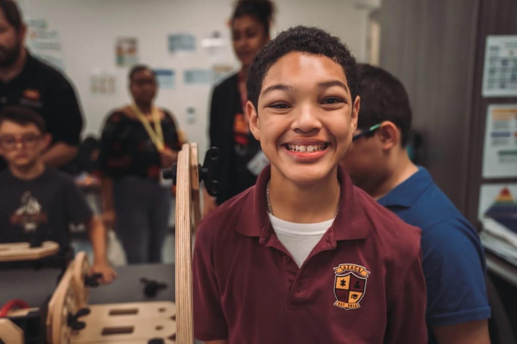 An Arizona Autism Charter School student smiles during class at the Phoenix Main Campus