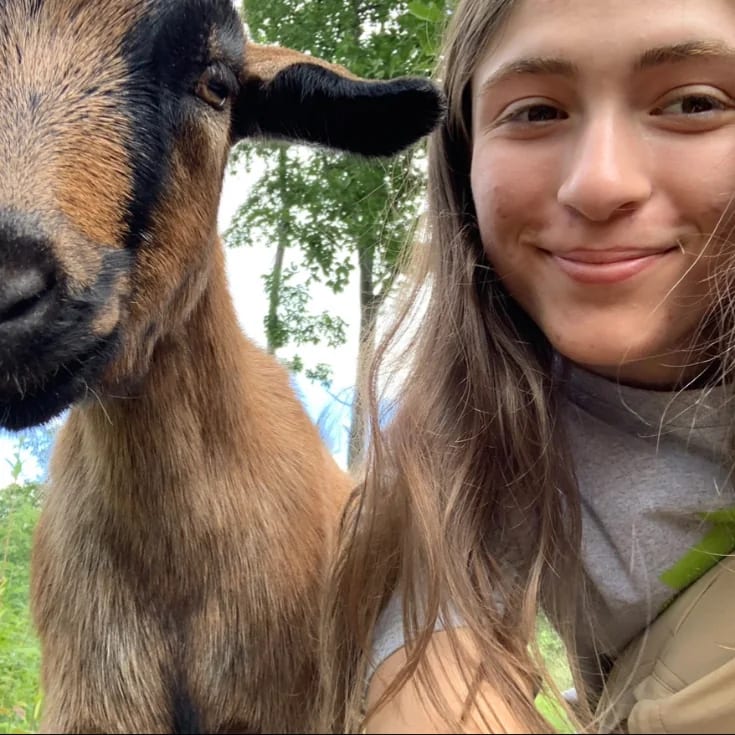 The Ellis School student participating in an outdoor animal-care activity in Pittsburgh.