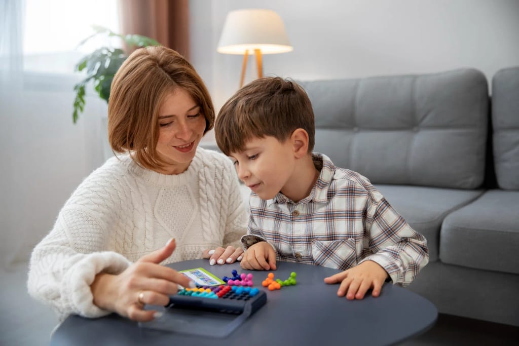 Adult and child playing with a colorful educational toy