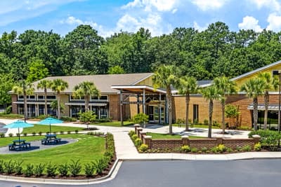 Exterior and landscaped entrance of The Crème School of Carolina Park in Mount Pleasant.