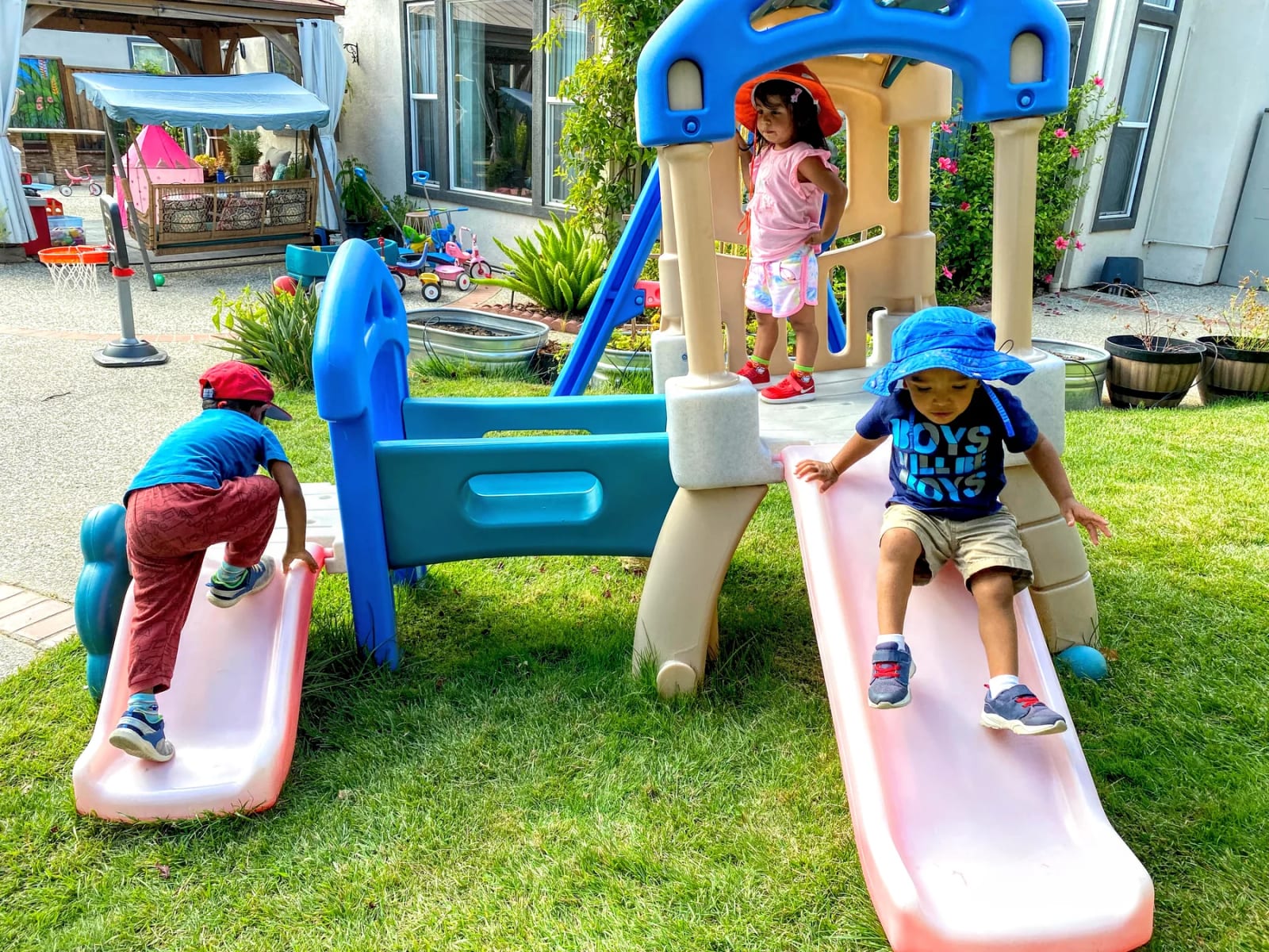 Gurukool children playing on an outdoor slide