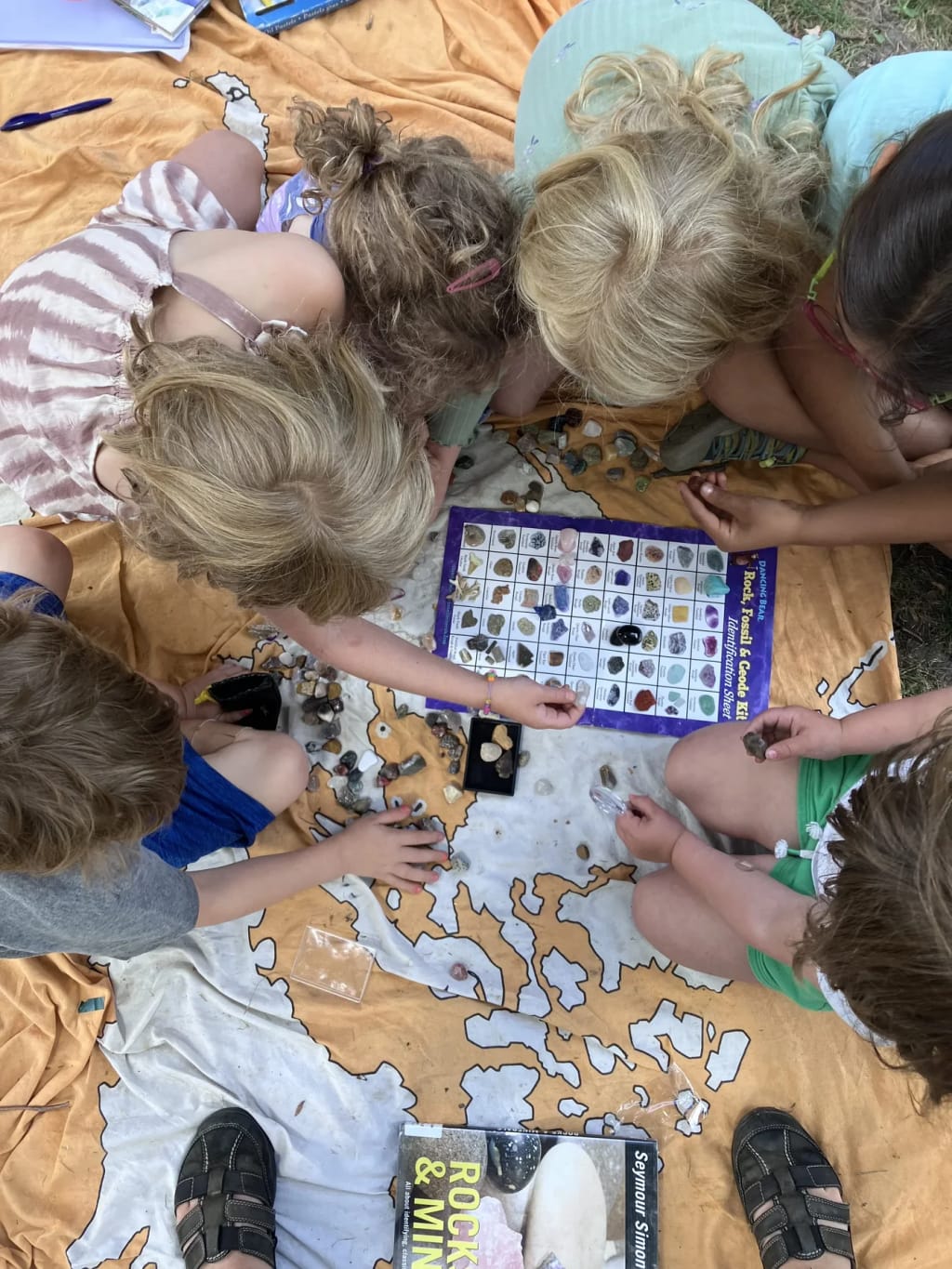 Students working together at a table at Blazing Star School