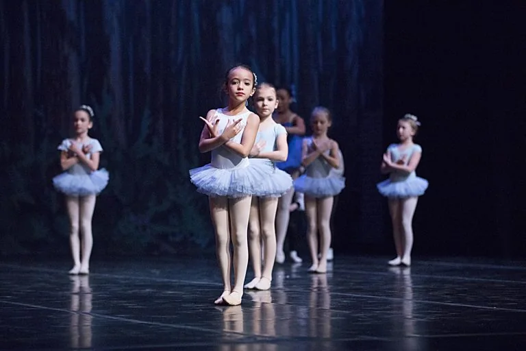 Ballet students performing together onstage at Baltimore School for the Arts.
