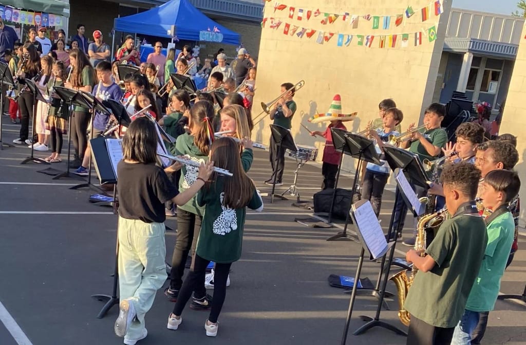 Cecil B. Stowers Elementary School in Cerritos, CA: students performing at an outdoor school event.