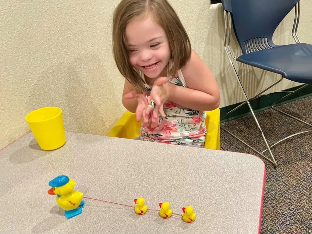 TLC Learning Center child exploring a classroom activity