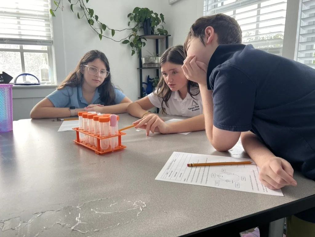 Tampa Pinnacle Academy students conducting a science experiment