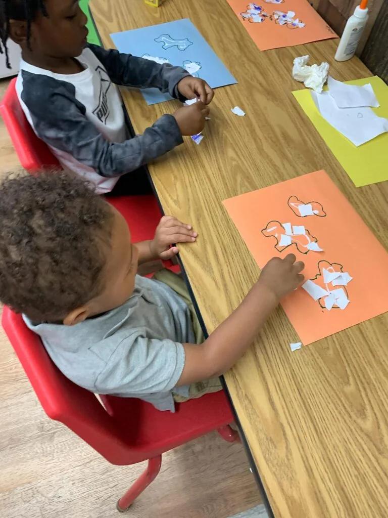 AA Academy Learning Center 3 in Hollywood: children completing a classroom art activity.