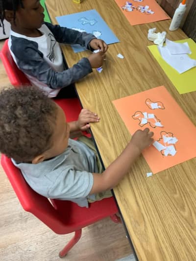 AA Academy Learning Center 3 in Hollywood: children completing a classroom art activity.