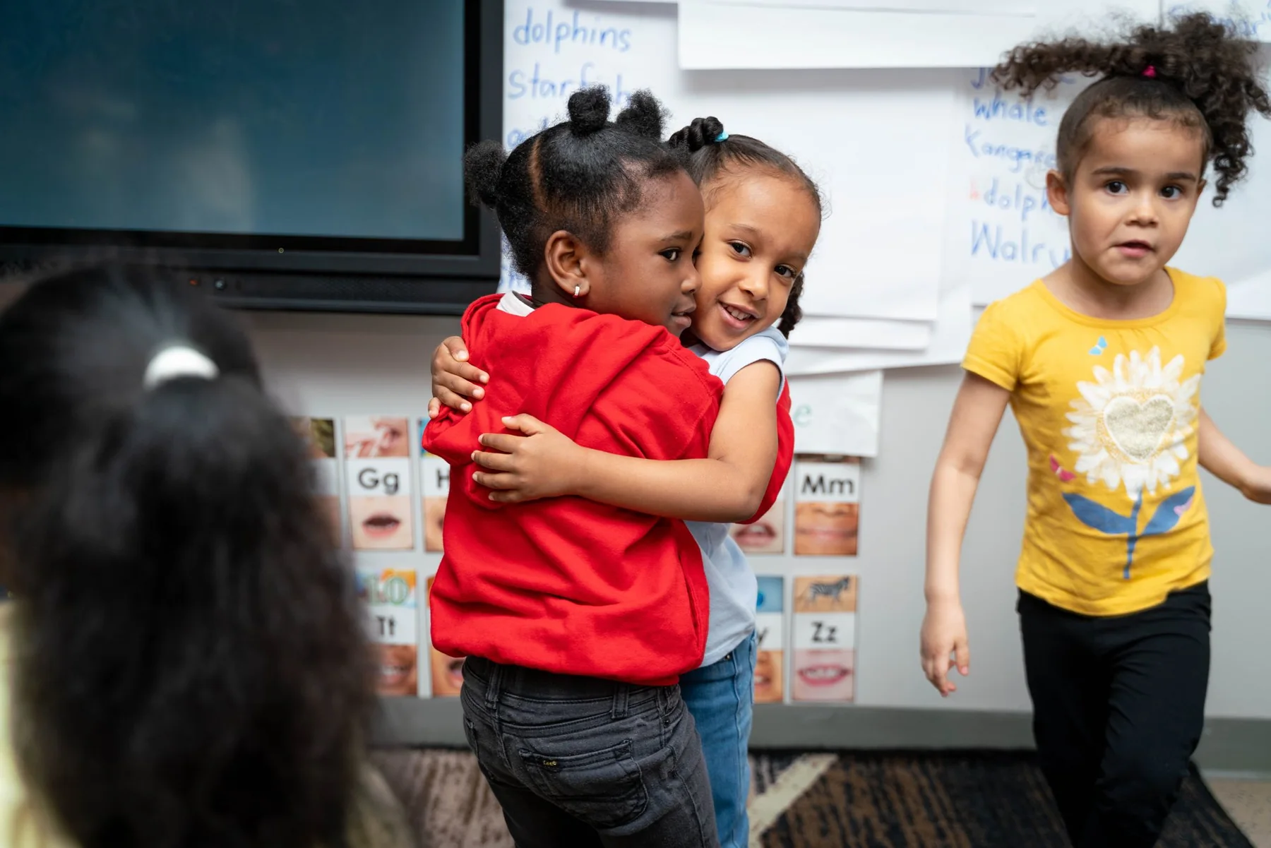 Garden of Learning and Discovery preschool children interacting in class