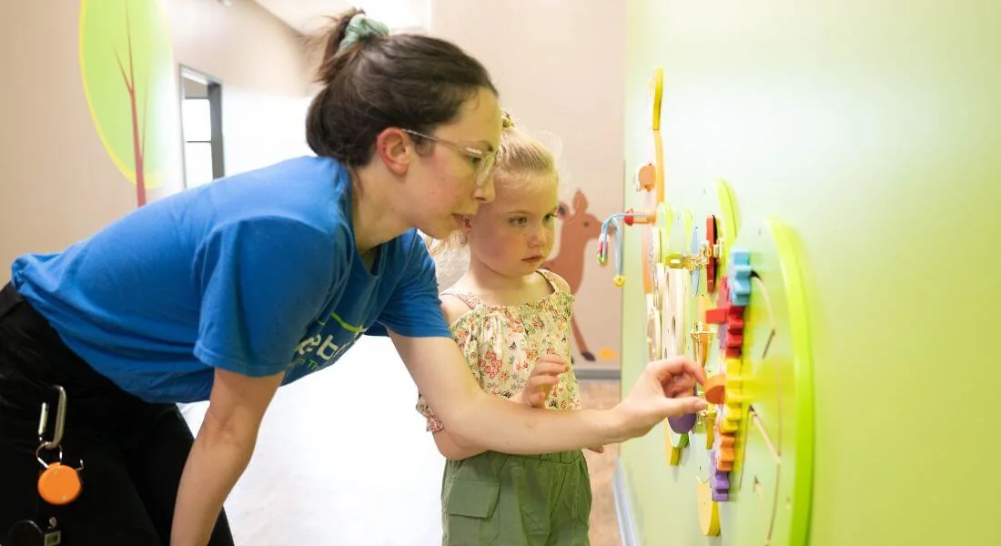 Hopebridge clinician engaging a child during an autism therapy session