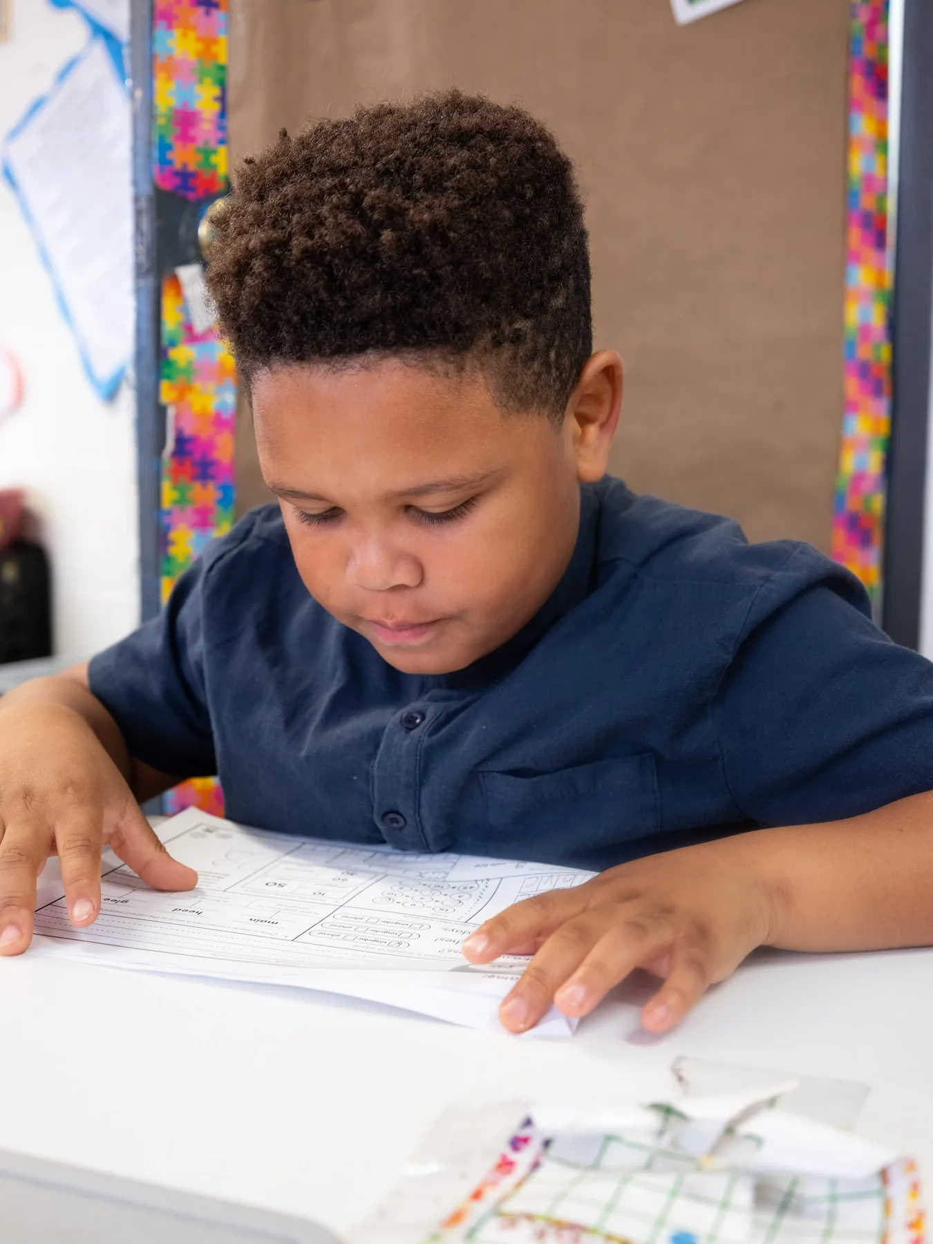 A student focused on classroom work at Mohammed Schools of Atlanta