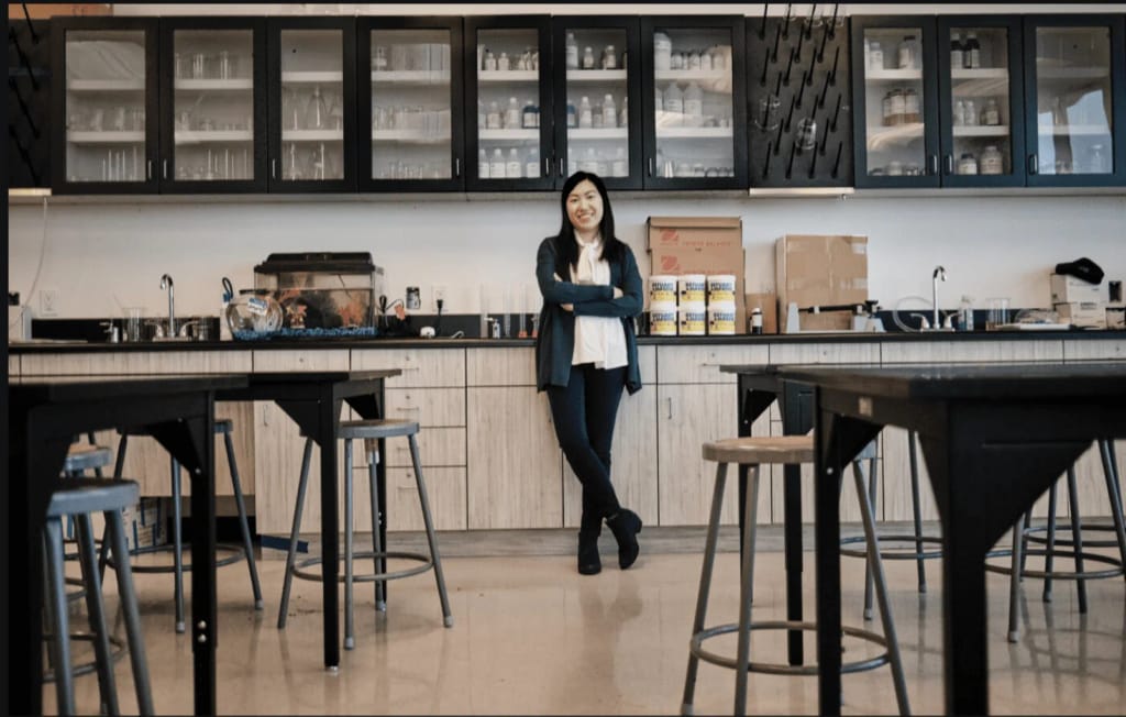 Nicotra Early College Charter science teacher in a laboratory