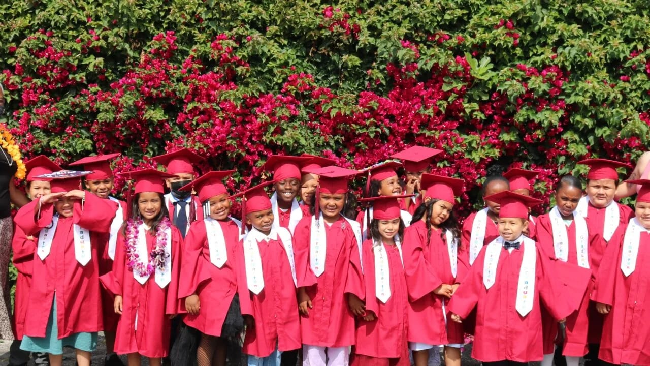 Invictus Leadership Academy graduates gather outdoors in Los Angeles